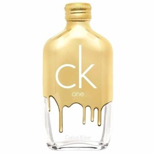 Frasco de vidrio tipo ovalado con detalles dorados representando el sentido de perfume unisex. Tapa a rosca