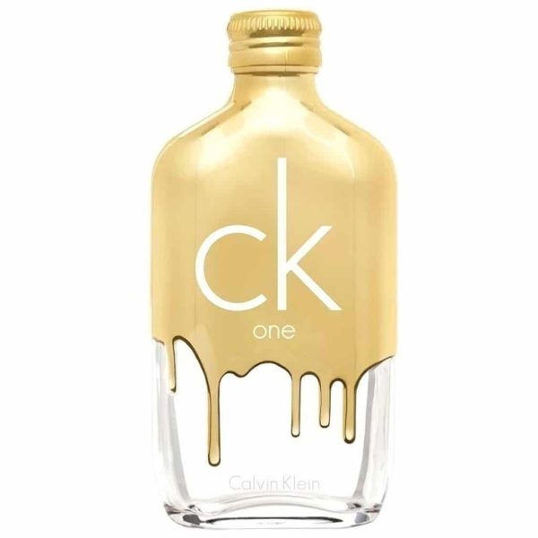 Frasco de vidrio tipo ovalado con detalles dorados representando el sentido de perfume unisex. Tapa a rosca